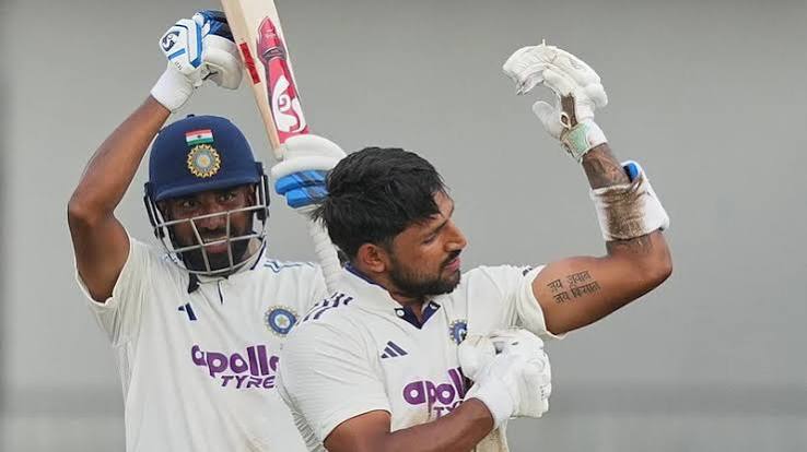 Dhruv Jurel celebrates his century.