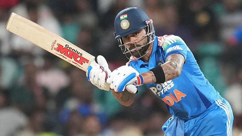 Virat Kohli celebrates his century during India's first ODI against West Indies