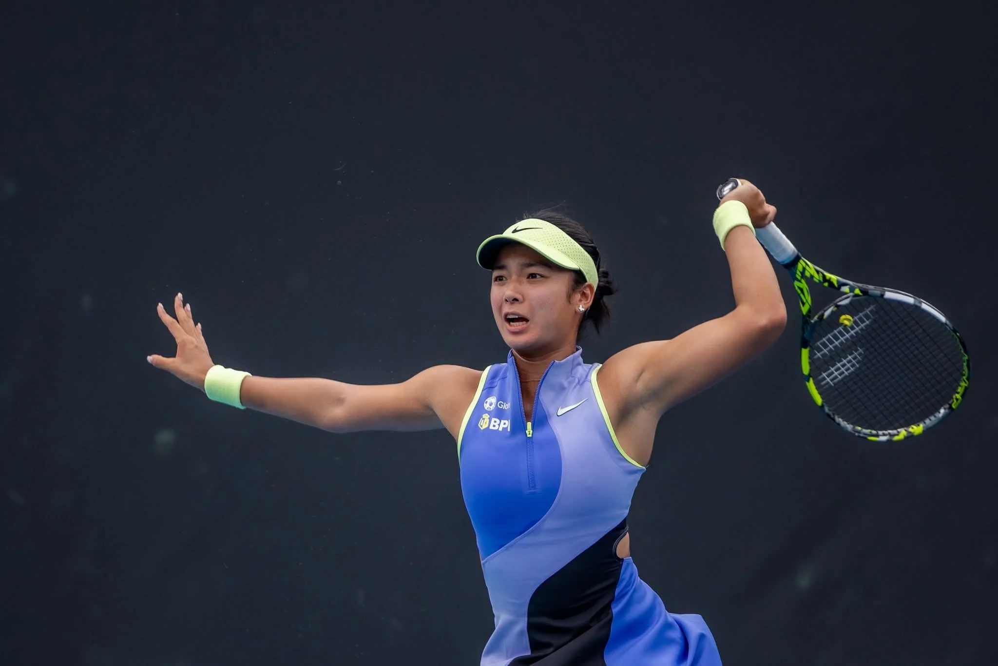 Alex Eala hitting a forehand during a match at the US Open